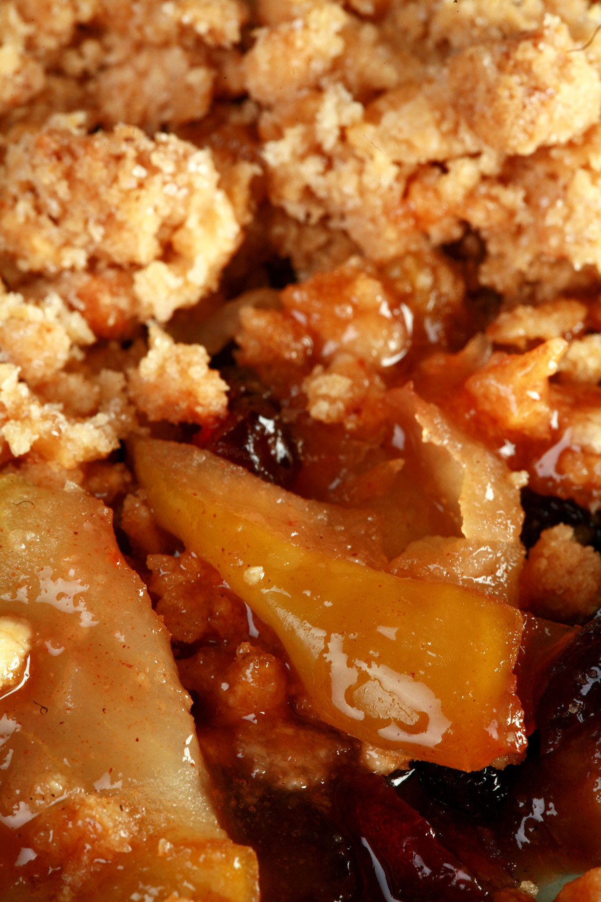 A plate with a generous serving of gluten-free Brandied Apple Crisp.