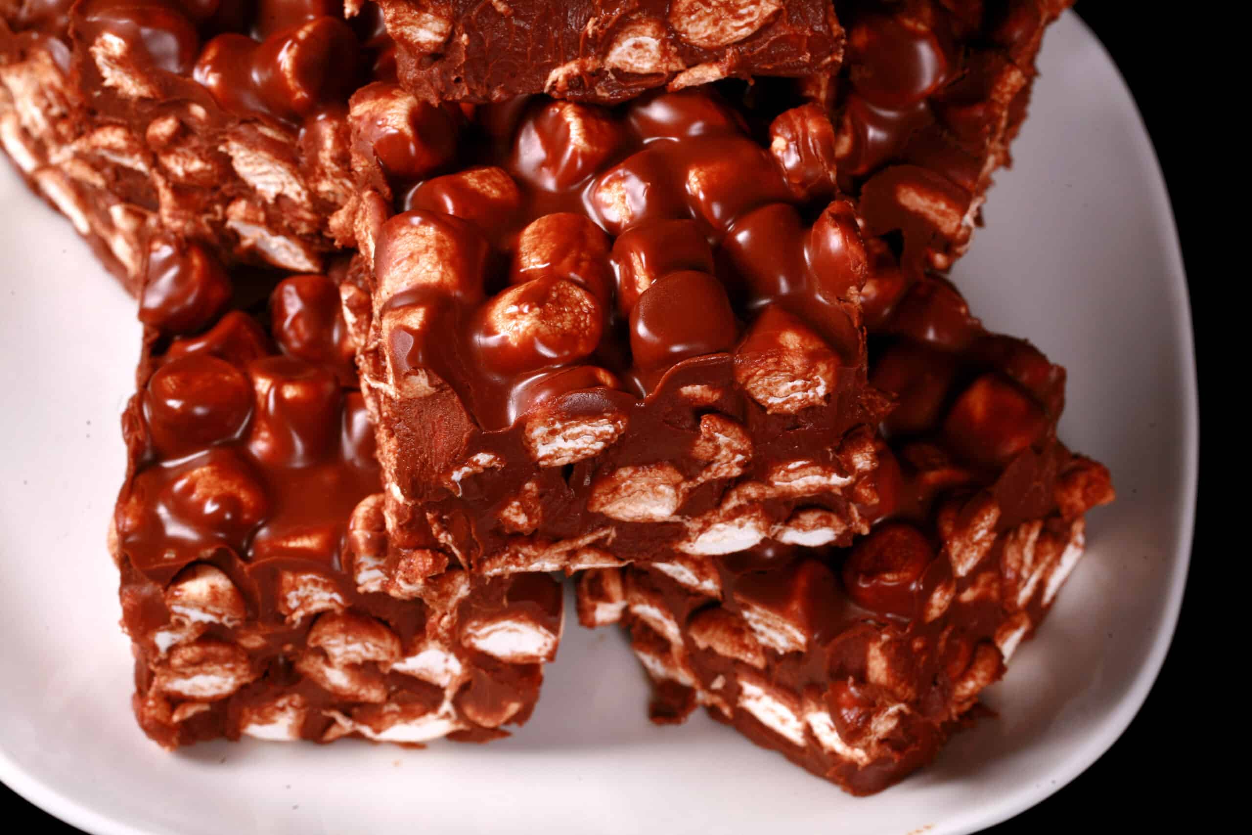 A plate of chocolate peanut butter marshmallow bars - Basically a chocolate fudge with mini marshmallows throughout..