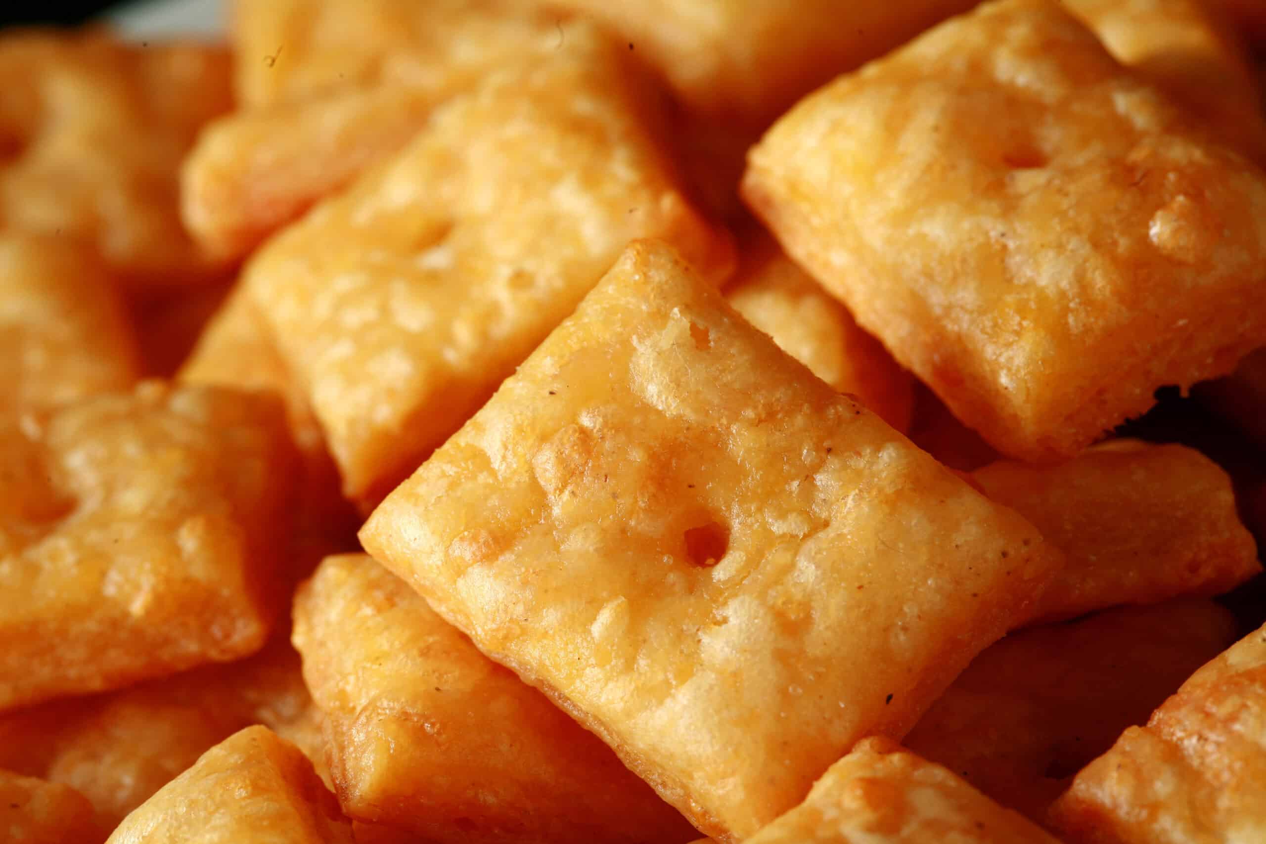 A plate of gluten free cheese its crackers.