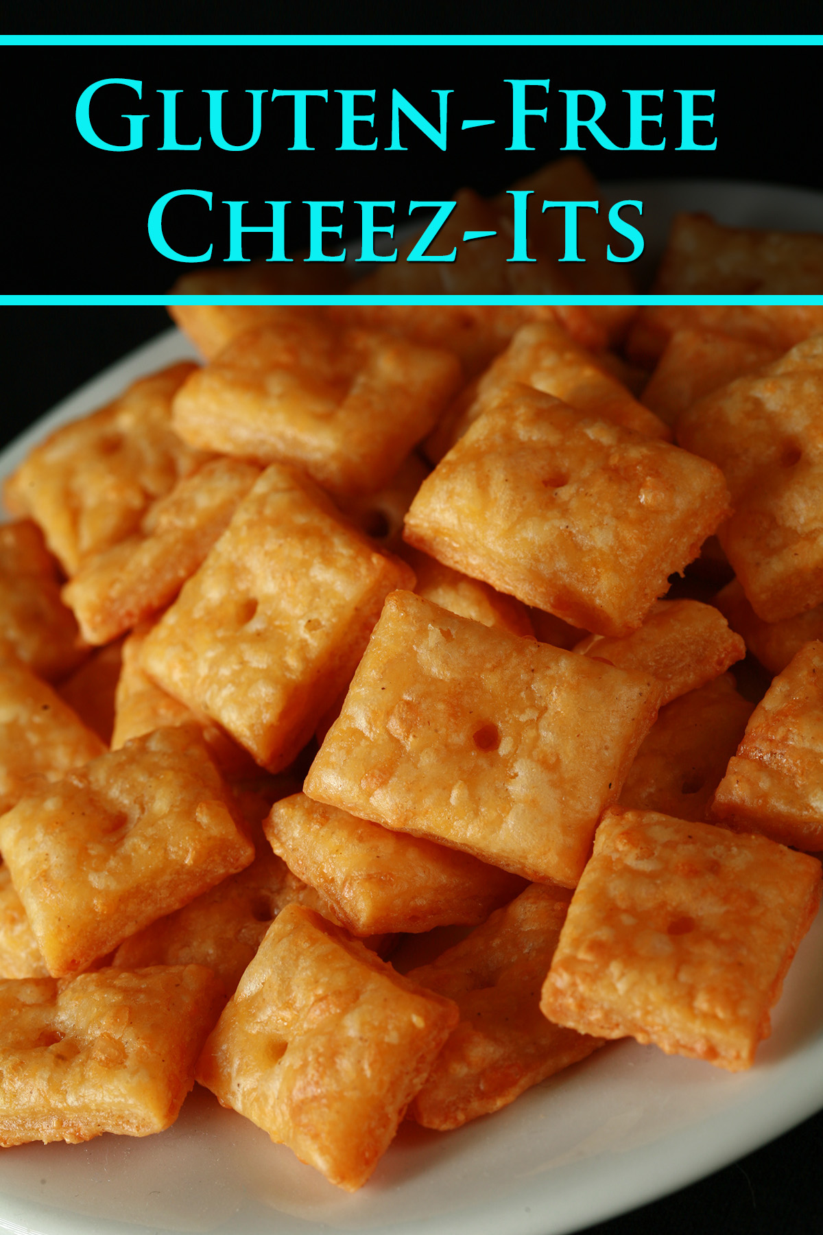 A pile of gluten-Free Cheez-its - little square gluten-free cheese crackers.