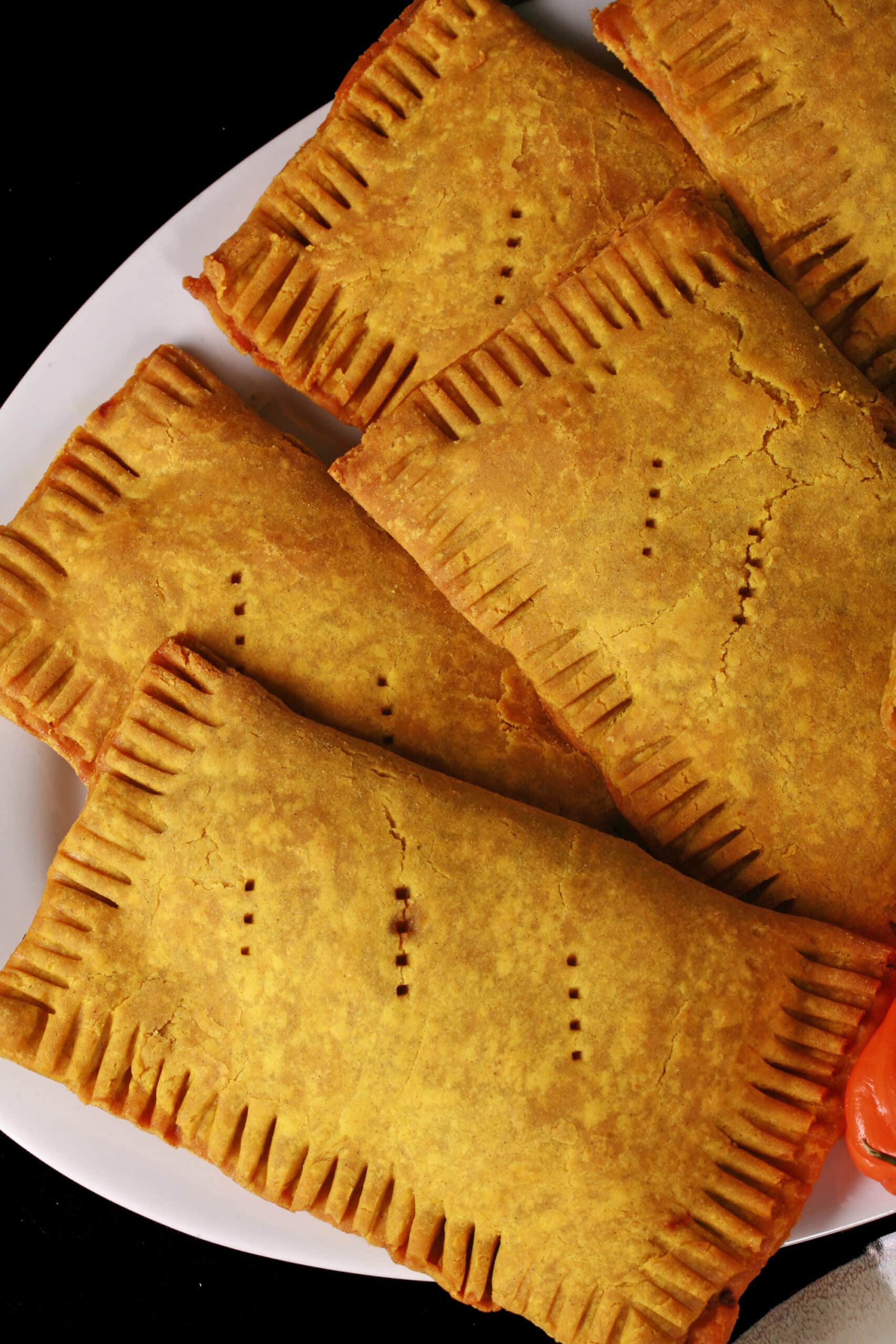 A plate of gluten free jamaican beef patties.
