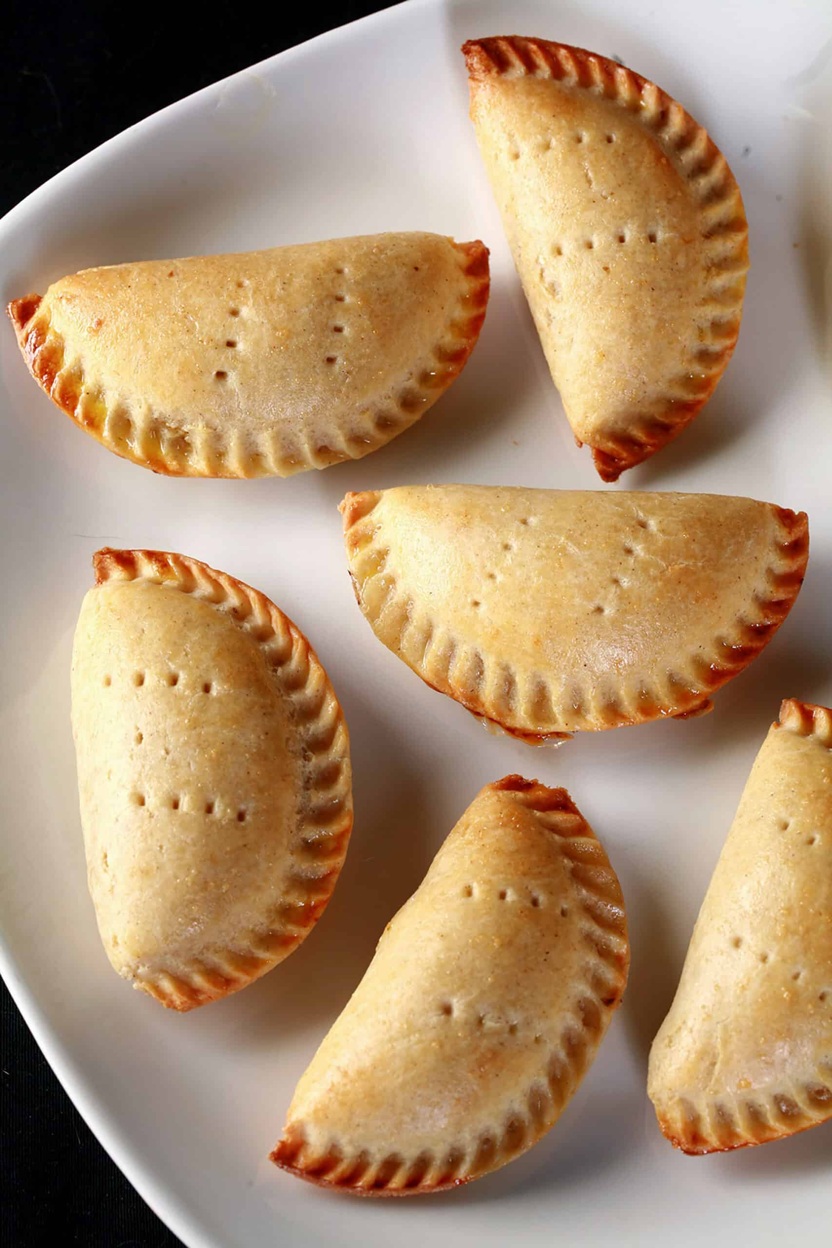 A plate of gluten free mushroom turnovers.