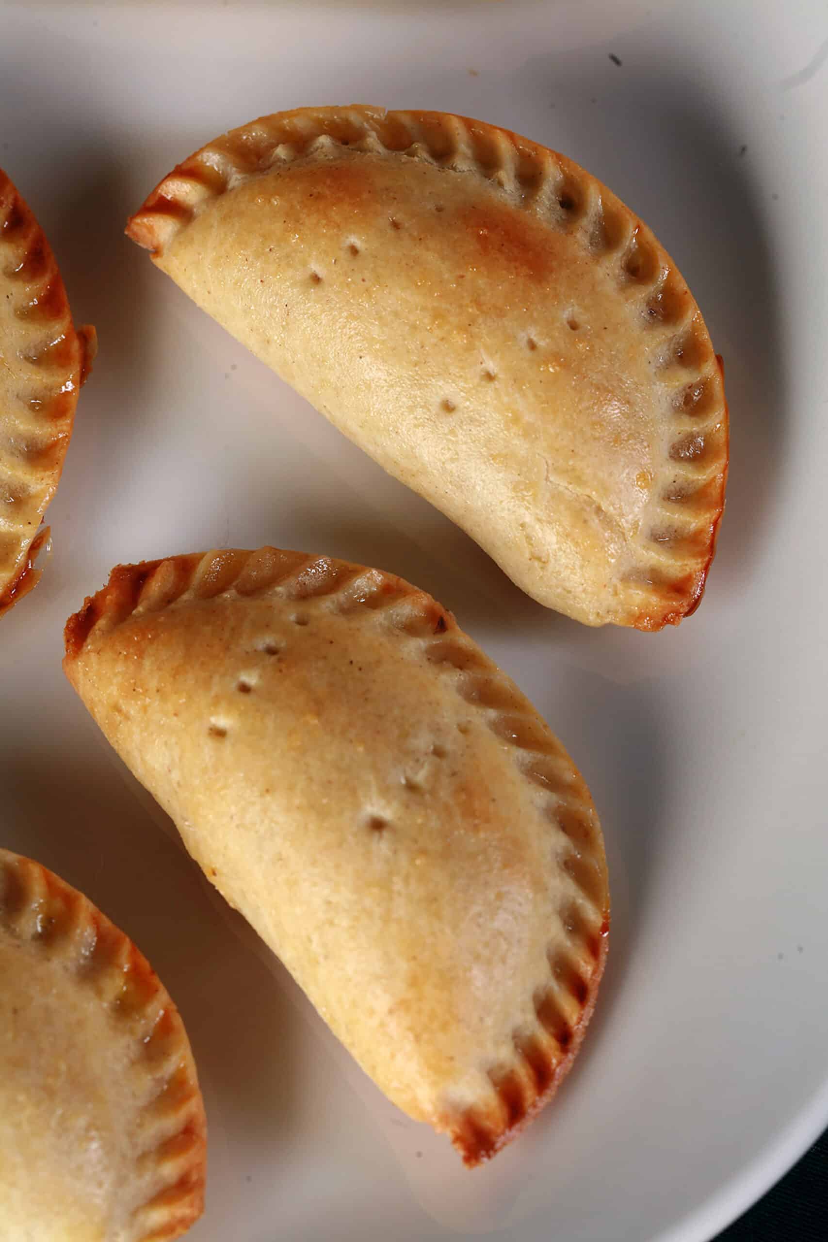 A plate of gluten-free mushroom turnovers.