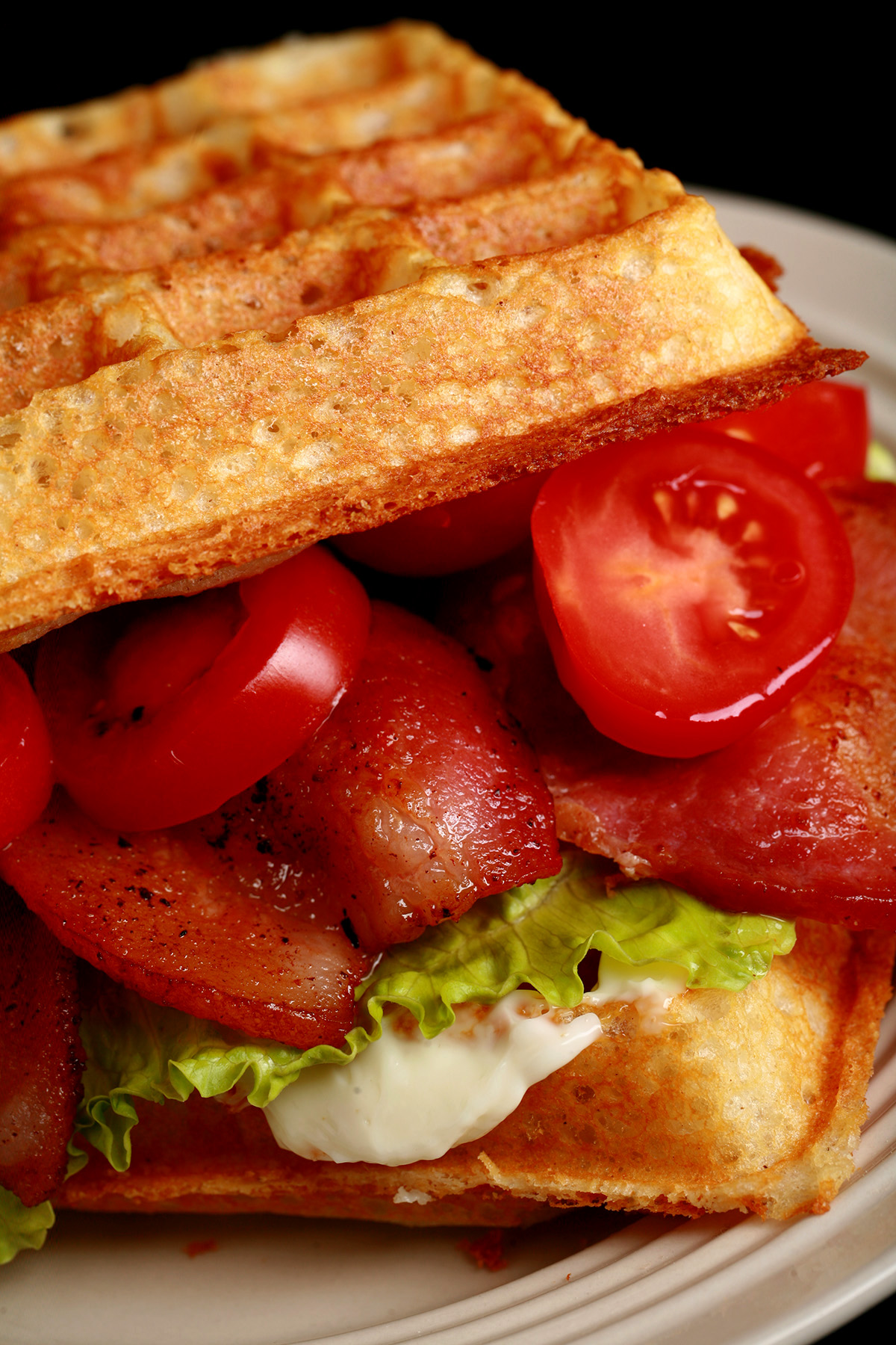 A BLT Sandwich made from gluten-free sourdough waffles.