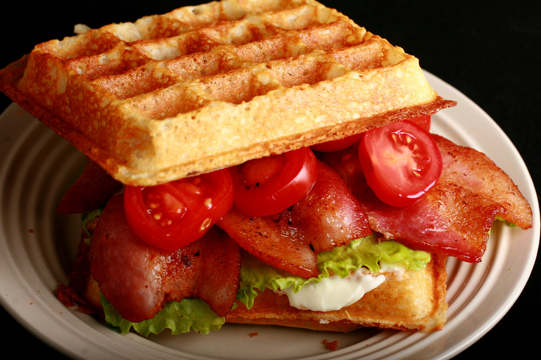 A BLT Sandwich made from gluten-free sourdough waffles.