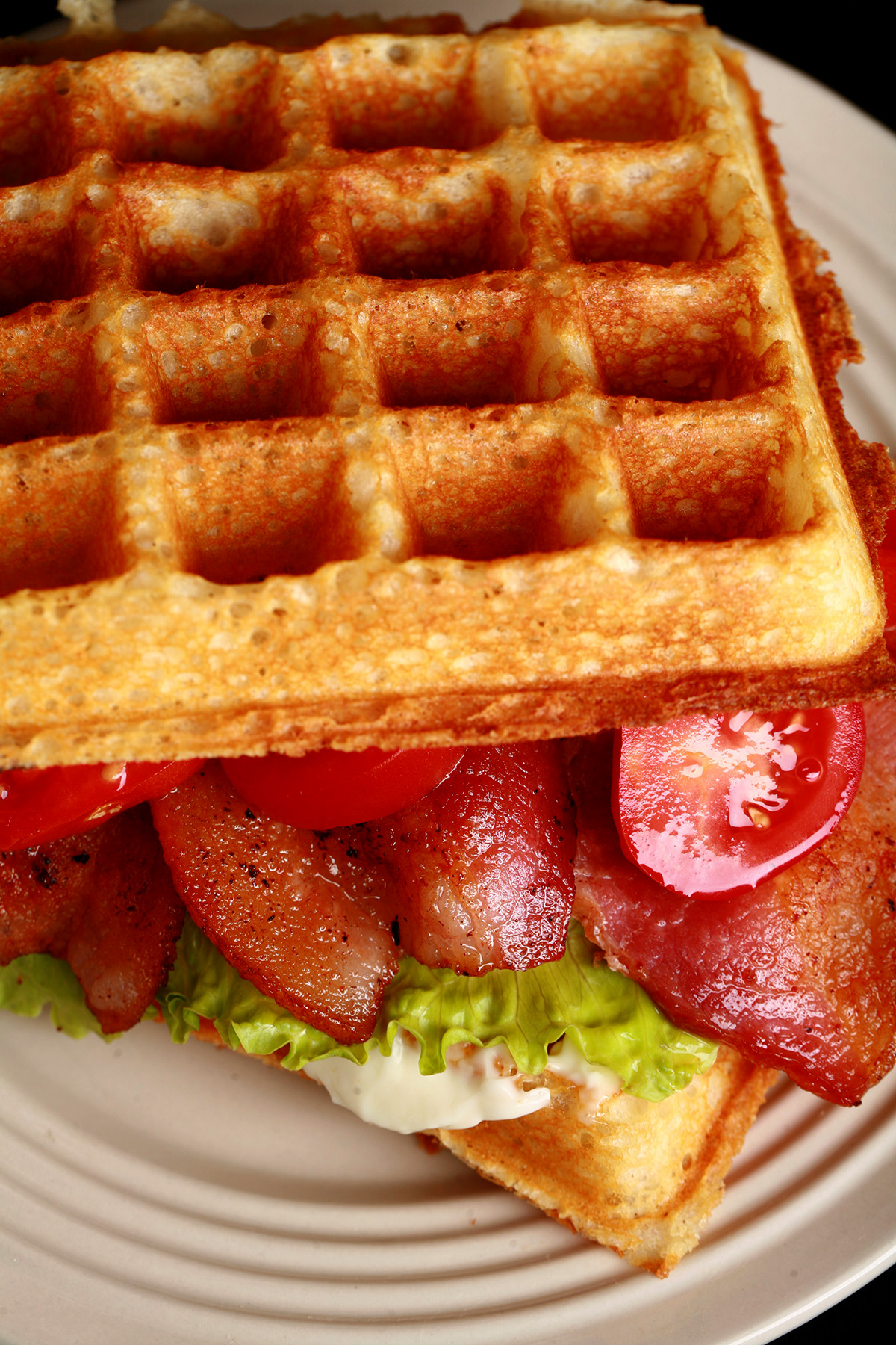 A BLT Sandwich made from gluten-free sourdough waffles.