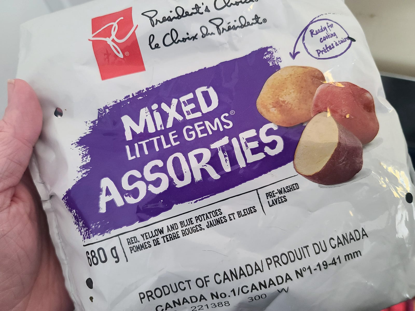 A bag of mixed little gems potatoes.