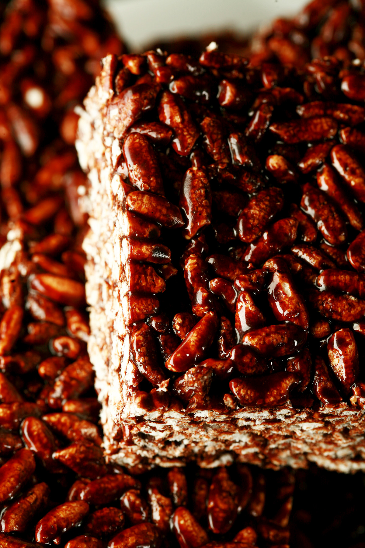 A close up view of large squares of puffed rice bars.